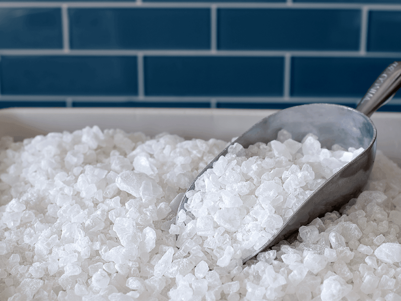 woman drinking water on a sunny day